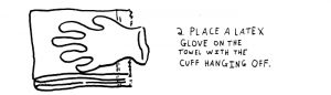 step-2-place-a-latex-glove-on-the-towel-with-the-cuff-hanging-off