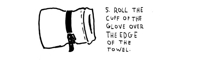 step-5-roll-the-cuff-of-the-glove-over-the-edge-of-the-towel