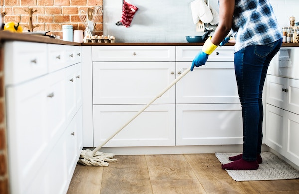 man cleaning floor