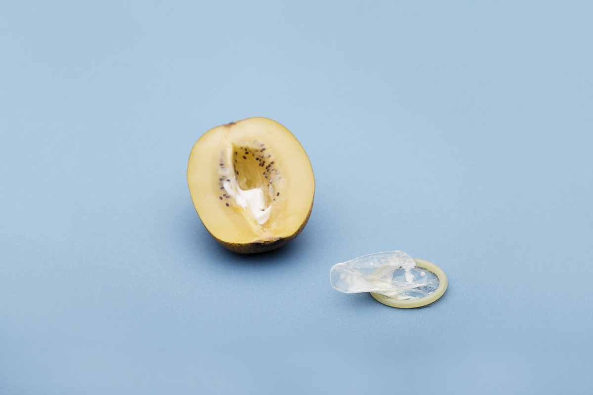 Filled peach with condom Filled peach with condom